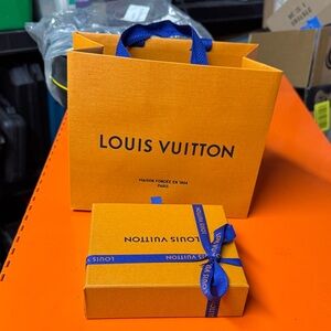 Louis Vuitton Orange Box and Bag with Blue Accents